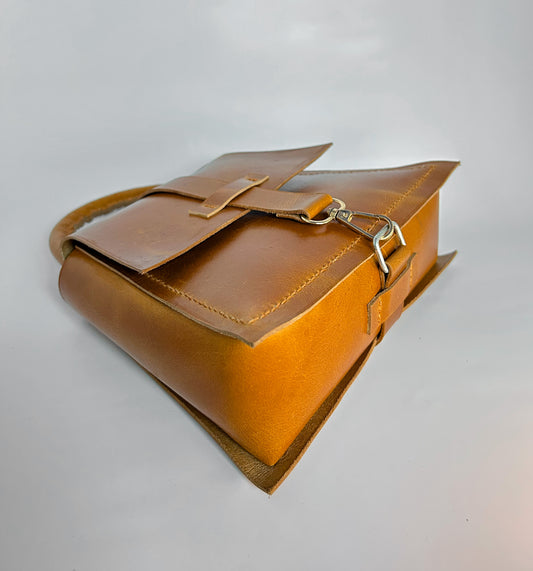 Anvaya Muse Tan Leather Handbag – Elegant Top Handle Bag with Snap Hook Closure