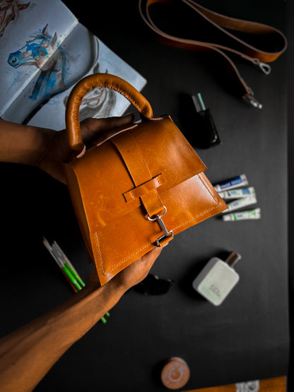 Anvaya Muse Tan Leather Handbag – Elegant Top Handle Bag with Snap Hook Closure